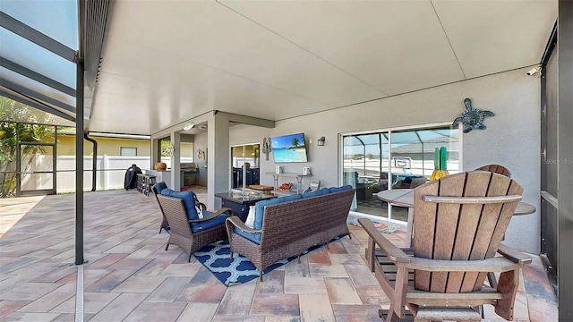 view of patio with fence and an outdoor living space