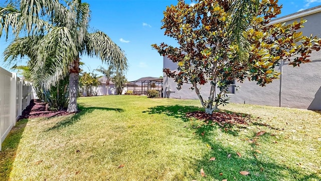 view of yard with a fenced backyard