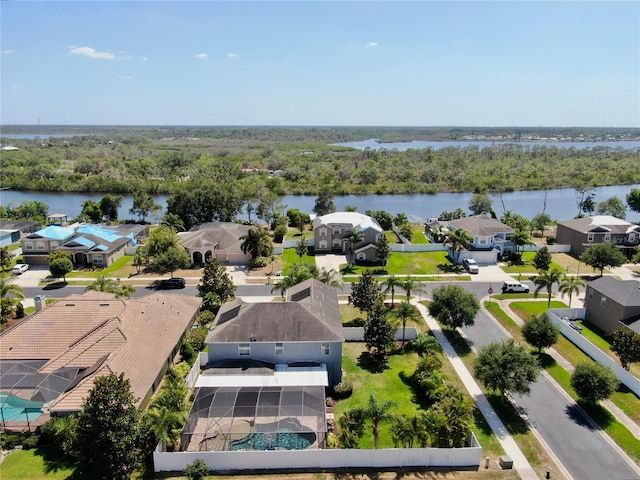 bird's eye view with a water view and a residential view