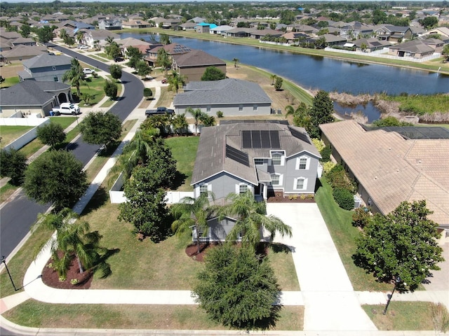 aerial view featuring a water view and a residential view
