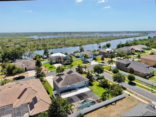 aerial view featuring a residential view and a water view