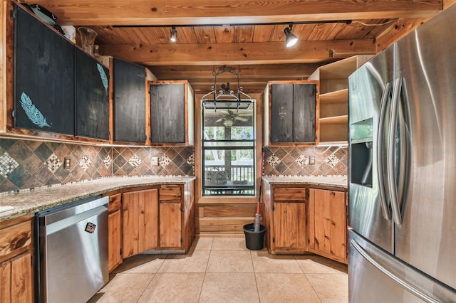 kitchen with beam ceiling, wood ceiling, backsplash, and appliances with stainless steel finishes