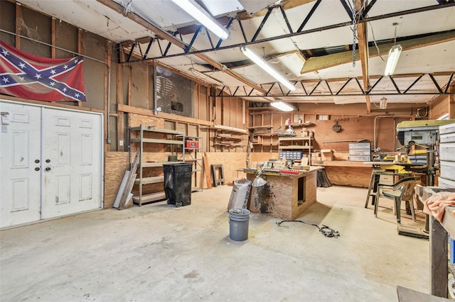 garage with a workshop area