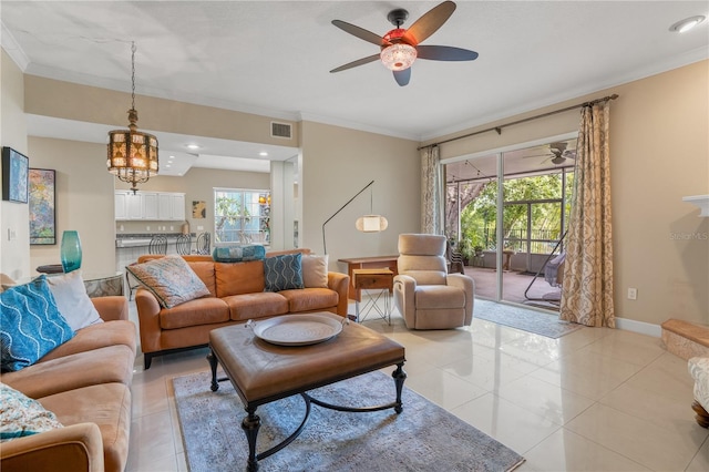 1750 Arabian Ln, Palm Harbor, FL 34685 - living room featuring ceiling fan, crown molding, light tile patterned flooring, baseboards, and a chandelier