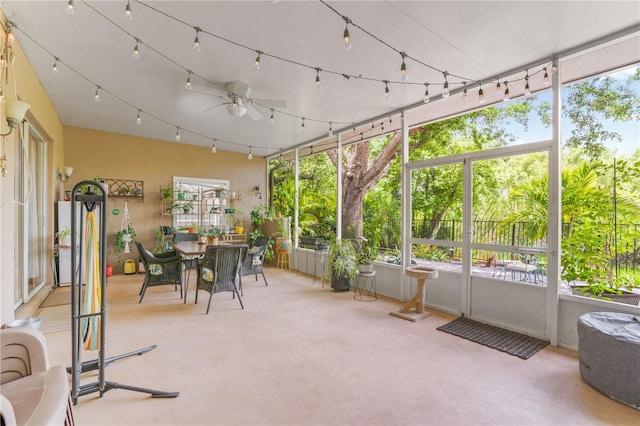 1750 Arabian Ln, Palm Harbor, FL 34685 - sunroom / solarium featuring ceiling fan and outdoor dining area