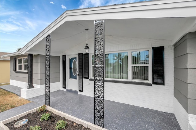 1516 Roundtree Rd, Holiday, FL 34690 - entrance to property featuring covered porch