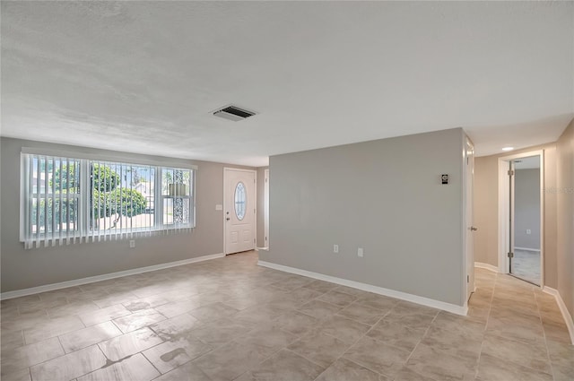1516 Roundtree Rd, Holiday, FL 34690 - interior space with visible vents and baseboards