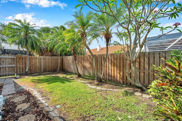 view of yard featuring a fenced backyard