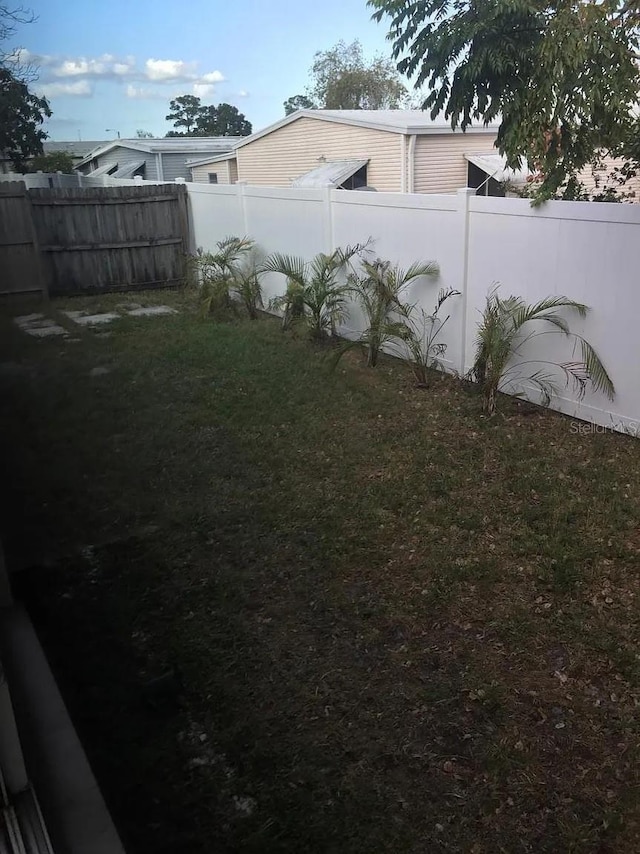 3115 Winchester Dr, Dunedin, FL 34698 - view of yard featuring fence