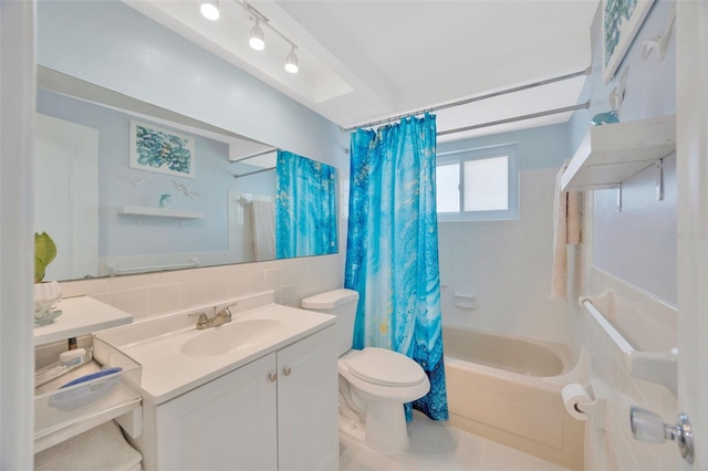 full bath with vanity, toilet, shower / bath combination with curtain, tile walls, and backsplash