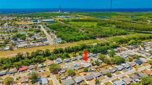 bird's eye view with a water view and a residential view