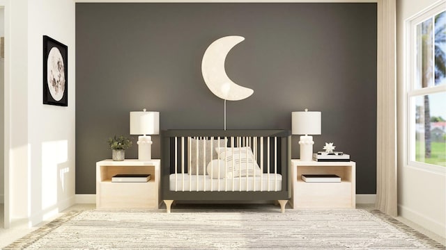bedroom featuring baseboards