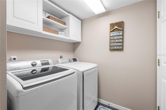 2512 Rustic Oaks Dr, Lutz, FL 33559 - laundry area with cabinet space, independent washer and dryer, and baseboards