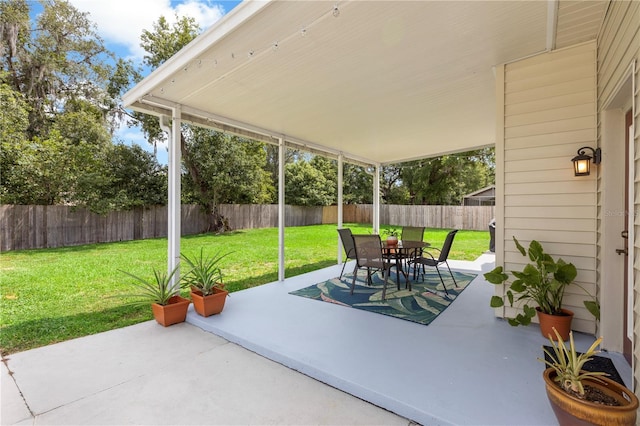 2512 Rustic Oaks Dr, Lutz, FL 33559 - view of patio with outdoor dining space