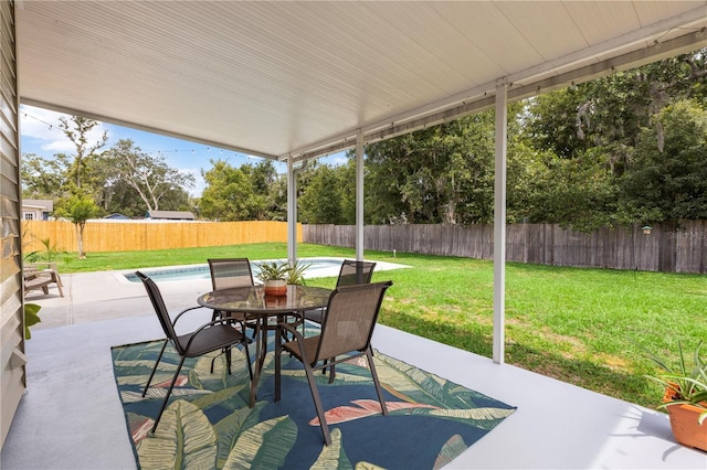 2512 Rustic Oaks Dr, Lutz, FL 33559 - view of patio featuring outdoor dining area