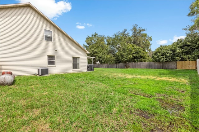 2512 Rustic Oaks Dr, Lutz, FL 33559 - view of yard with central AC unit