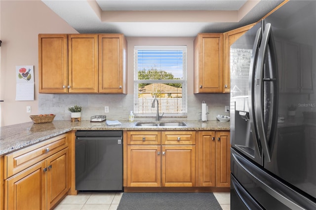 2512 Rustic Oaks Dr, Lutz, FL 33559 - kitchen featuring dishwasher, fridge with ice dispenser, a sink, brown cabinets, and backsplash