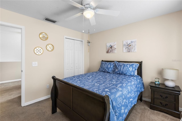 2512 Rustic Oaks Dr, Lutz, FL 33559 - bedroom with carpet flooring, baseboards, a closet, and a ceiling fan