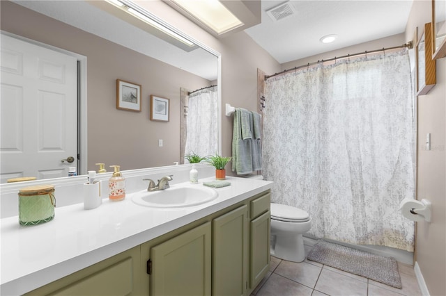 2512 Rustic Oaks Dr, Lutz, FL 33559 - full bath with vanity, toilet, tile patterned floors, and a shower with curtain