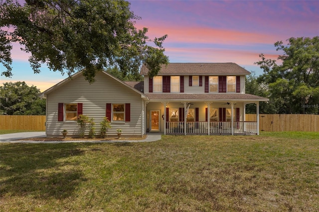 2512 Rustic Oaks Dr, Lutz, FL 33559 - view of front of property featuring ceiling fan and a shingled roof