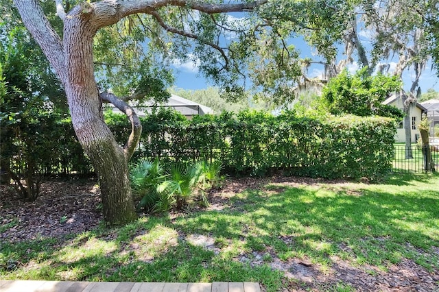 view of yard featuring fence