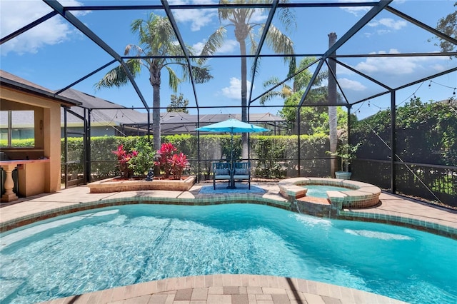 view of pool with a patio, a lanai, and a pool with connected hot tub