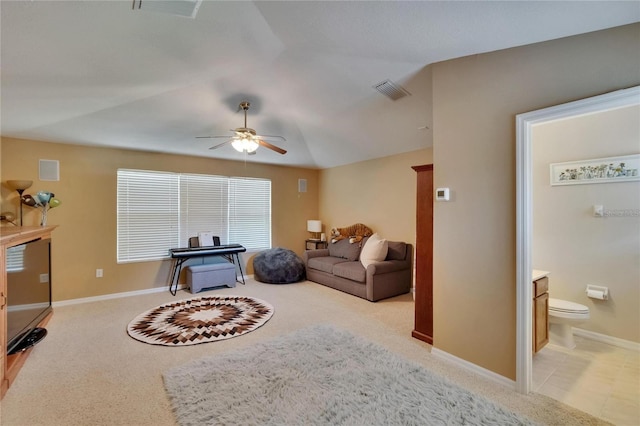 living room with baseboards, visible vents, a ceiling fan, and light colored carpet