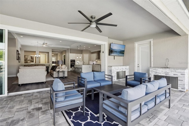 5477 Wayfarer Ave, Apollo Beach, FL 33572 - view of patio / terrace featuring ceiling fan, outdoor lounge area, and an outdoor kitchen
