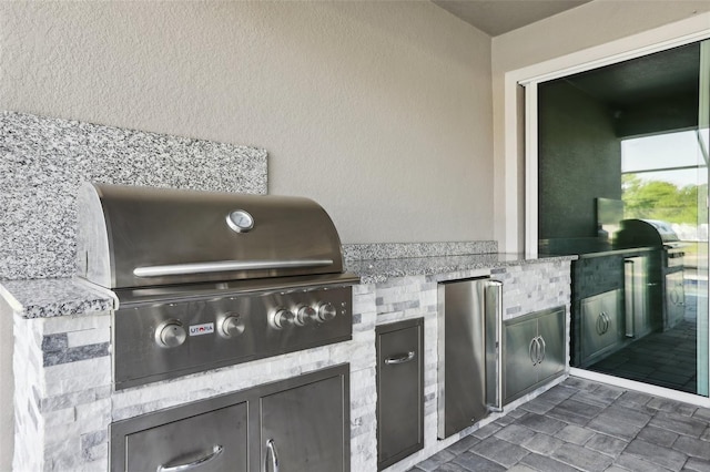 5477 Wayfarer Ave, Apollo Beach, FL 33572 - view of patio / terrace featuring area for grilling and exterior kitchen