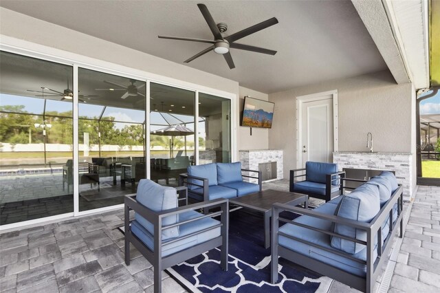 5477 Wayfarer Ave, Apollo Beach, FL 33572 - view of patio with a ceiling fan and an outdoor hangout area