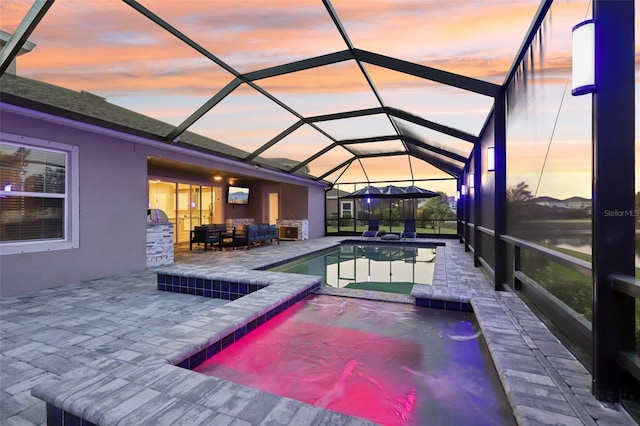 5477 Wayfarer Ave, Apollo Beach, FL 33572 - swimming pool with an outdoor living space, a patio, an in-ground hot tub, and glass enclosure