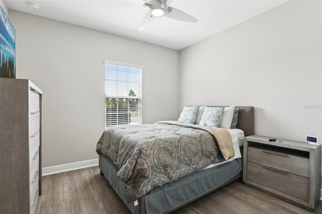 5477 Wayfarer Ave, Apollo Beach, FL 33572 - bedroom featuring wood finished floors, baseboards, and ceiling fan