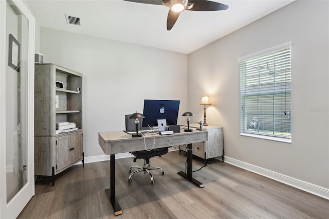 5477 Wayfarer Ave, Apollo Beach, FL 33572 - office with a ceiling fan, wood finished floors, and baseboards