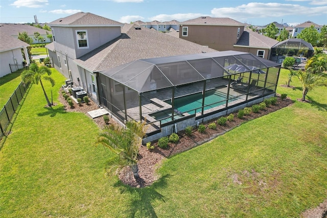 5477 Wayfarer Ave, Apollo Beach, FL 33572 - back of property with roof with shingles, a residential view, a patio, a pool with connected hot tub, and stucco siding
