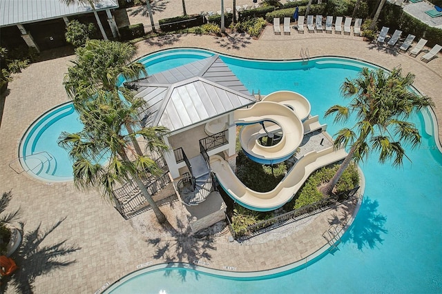 5477 Wayfarer Ave, Apollo Beach, FL 33572 - community pool featuring a water slide and a patio area