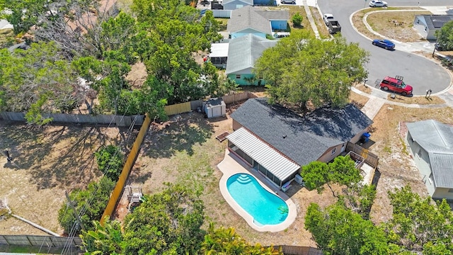 birds eye view of property with a residential view