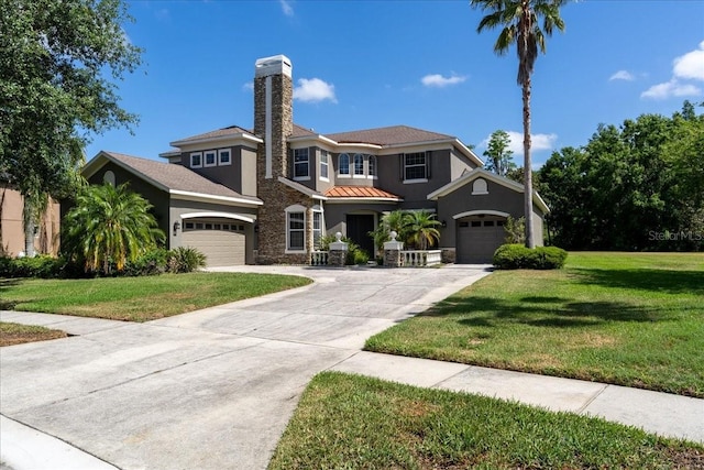 16637 Ashton Green Dr, Lutz, FL 33558 - view of front of home featuring stucco siding, concrete driveway, stone siding, and a front yard