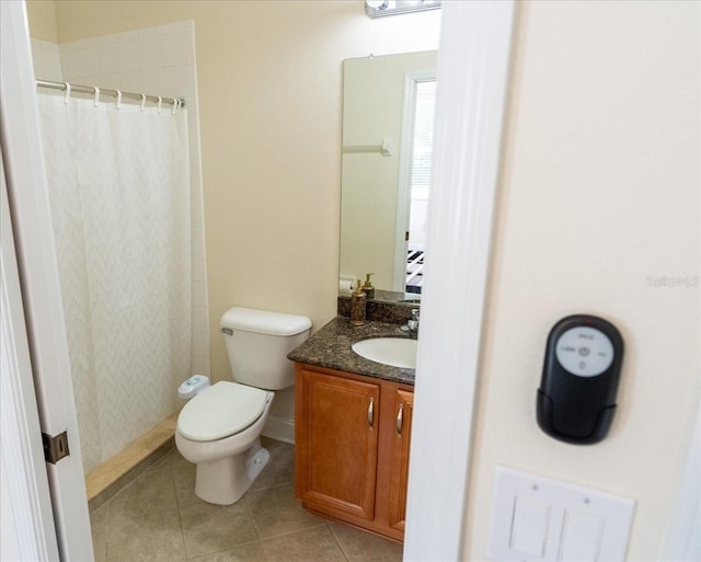 16637 Ashton Green Dr, Lutz, FL 33558 - bathroom featuring vanity, tile patterned flooring, toilet, and curtained shower