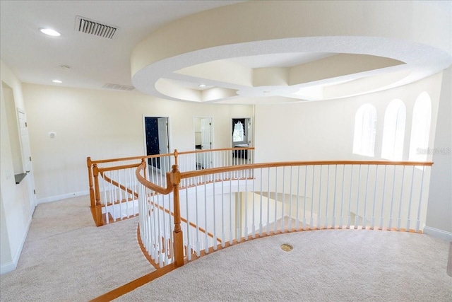 16637 Ashton Green Dr, Lutz, FL 33558 - hallway with carpet floors, an upstairs landing, recessed lighting, and visible vents