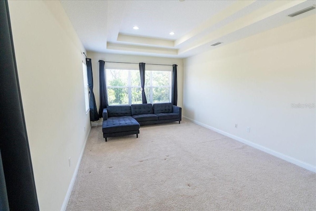 16637 Ashton Green Dr, Lutz, FL 33558 - carpeted living area with baseboards, recessed lighting, a raised ceiling, and visible vents