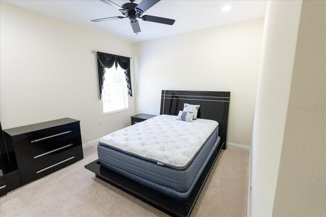 16637 Ashton Green Dr, Lutz, FL 33558 - bedroom featuring baseboards, ceiling fan, recessed lighting, and light colored carpet