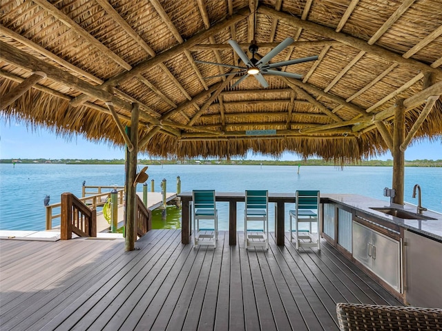 326 176th Avenue Cir, Redington Shores, FL 33708 - dock area featuring a sink, a gazebo, a water view, and an outdoor kitchen