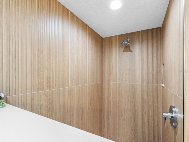 326 176th Avenue Cir, Redington Shores, FL 33708 - bathroom view of a shower and a textured ceiling
