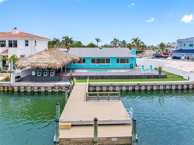 326 176th Avenue Cir, Redington Shores, FL 33708 - dock area featuring a water view, a fenced backyard, a swimming pool, and a patio