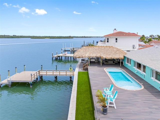 326 176th Avenue Cir, Redington Shores, FL 33708 - dock area featuring a water view, an outdoor pool, and boat lift
