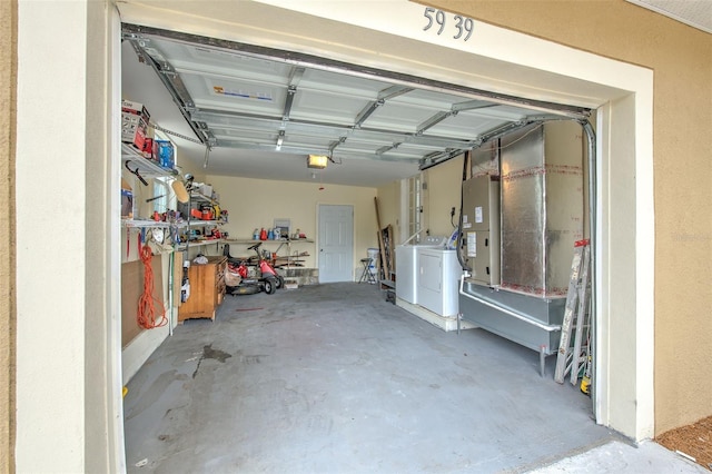 5939 14th St, Zephyrhills, FL 33542 - garage featuring washing machine and clothes dryer