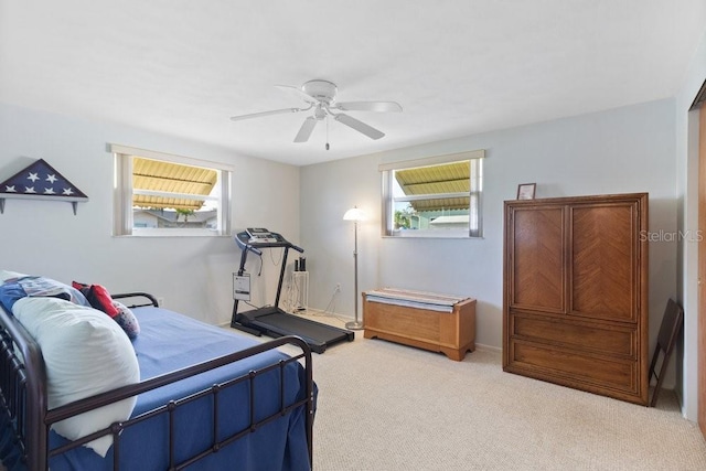7534 Culberson Dr, Port Richey, FL 34668 - carpeted bedroom featuring a ceiling fan