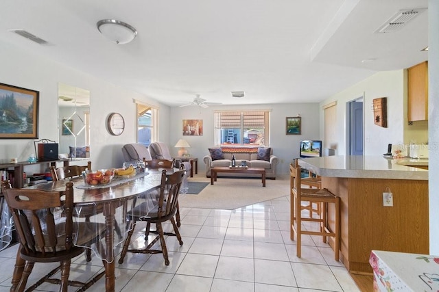 7534 Culberson Dr, Port Richey, FL 34668 - dining room featuring light tile patterned flooring, visible vents, and plenty of natural light