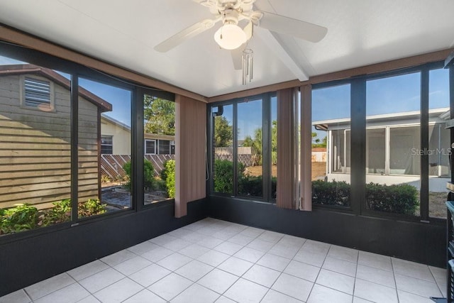 7534 Culberson Dr, Port Richey, FL 34668 - unfurnished sunroom with tile patterned flooring