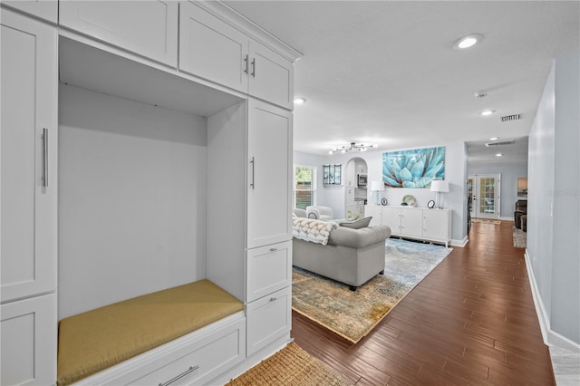 mudroom featuring recessed lighting, baseboards, visible vents, and dark wood-style floors